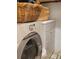 Bright laundry room with washer, dryer, and ample storage at 9130 Dollanger Ct, Orlando, FL 32819