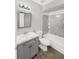 Clean bathroom with gray vanity, shower/tub combo, and tile floor at 105 Northlake Dr # 105, Sanford, FL 32773