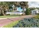 Northlake Village entrance with landscaping and brick road at 105 Northlake Dr # 105, Sanford, FL 32773