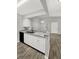Kitchen boasts granite countertops and white cabinets at 105 Northlake Dr # 105, Sanford, FL 32773