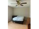 Bedroom with light wood floors, a ceiling fan, and a bed frame at 1320 S Oleander Ave, Sanford, FL 32771