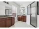 Elegant bathroom with granite countertop, double vanity and shower at 1918 Arden Oaks Dr, Ocoee, FL 34761
