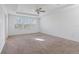 Spacious bedroom with ceiling fan and multiple windows at 1918 Arden Oaks Dr, Ocoee, FL 34761