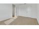 Simple bedroom with carpet flooring and neutral walls at 1918 Arden Oaks Dr, Ocoee, FL 34761
