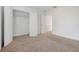 Simple bedroom with carpet, double door closet and neutral walls at 1918 Arden Oaks Dr, Ocoee, FL 34761