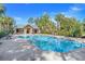 Relaxing community pool with patio furniture at 1918 Arden Oaks Dr, Ocoee, FL 34761