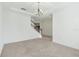 Bright dining room with neutral carpeting and a chandelier at 1918 Arden Oaks Dr, Ocoee, FL 34761