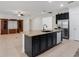 Kitchen island with granite countertops and stainless steel appliances at 1918 Arden Oaks Dr, Ocoee, FL 34761