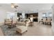 Open living room and kitchen with tile floors and ceiling fan at 1918 Arden Oaks Dr, Ocoee, FL 34761