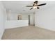 Bright loft area with ceiling fan and access to other rooms at 1918 Arden Oaks Dr, Ocoee, FL 34761