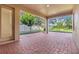 Brick paved patio with covered area and access to backyard at 1918 Arden Oaks Dr, Ocoee, FL 34761