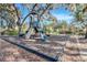 playground with slides, climbing structures, and safety surface at 1918 Arden Oaks Dr, Ocoee, FL 34761