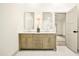 Bathroom features a double vanity, stylish fixtures, and great storage at 2337 Worthington Rd, Maitland, FL 32751