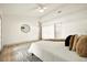 Spacious bedroom with neutral colors, stylish furniture, and good natural light at 2337 Worthington Rd, Maitland, FL 32751