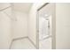 A closet leads to a bathroom with an enclosed shower at 2337 Worthington Rd, Maitland, FL 32751