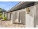 A close up of the garage doors shows the home's unique architectural features and brick driveway at 2337 Worthington Rd, Maitland, FL 32751