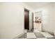 Hallway featuring checkered flooring at 2337 Worthington Rd, Maitland, FL 32751