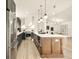 This modern kitchen features a large island, stainless steel appliances, and open floor plan at 2337 Worthington Rd, Maitland, FL 32751