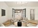 Living area that opens through french doors to an outdoor living space at 2337 Worthington Rd, Maitland, FL 32751