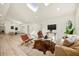 Spacious living room with modern furniture, skylights, and an open floor plan at 2337 Worthington Rd, Maitland, FL 32751