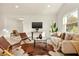 Bright living room with modern decor, stylish seating, and ample natural light at 2337 Worthington Rd, Maitland, FL 32751