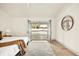 Bright main bedroom features french doors and pool view at 2337 Worthington Rd, Maitland, FL 32751