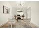 Well-lit office space with stylish lighting, a work desk, and neutral decor at 2337 Worthington Rd, Maitland, FL 32751