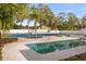 Gorgeous pool and tennis court in a private backyard setting with lush landscaping at 2337 Worthington Rd, Maitland, FL 32751