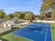 Expansive tennis court and swimming pool, creating an ideal outdoor entertainment space with meticulous landscaping at 2337 Worthington Rd, Maitland, FL 32751