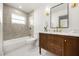 Beautiful bathroom with a shower-tub combination and a wooden vanity with a marble countertop at 2631 Falmouth Rd, Maitland, FL 32751