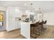Modern kitchen featuring a large center island with seating and modern appliances at 2631 Falmouth Rd, Maitland, FL 32751