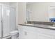 Double vanity bathroom with walk-in shower at 2763 Oxymoron Way, Kissimmee, FL 34746