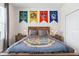 Cozy bedroom with a wooden bed frame and Hogwarts house banners at 2763 Oxymoron Way, Kissimmee, FL 34746