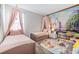 Two twin beds with princess theme and castle mural at 2763 Oxymoron Way, Kissimmee, FL 34746