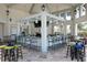 Community room with a bar and seating area at 2763 Oxymoron Way, Kissimmee, FL 34746