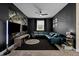 Star Wars themed game room with sectional sofa and large screen TVs at 2763 Oxymoron Way, Kissimmee, FL 34746