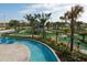 Lazy river with mini golf course and palm trees at 2763 Oxymoron Way, Kissimmee, FL 34746