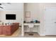Small home office with desk, chair, and printer in hallway at 2763 Oxymoron Way, Kissimmee, FL 34746