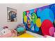 Fun playroom with colorful decor and comfortable seating at 2763 Oxymoron Way, Kissimmee, FL 34746