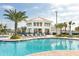 Resort-style pool with a large deck and pool bar at 2763 Oxymoron Way, Kissimmee, FL 34746