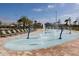 Spray park with various water features and lounge chairs at 2763 Oxymoron Way, Kissimmee, FL 34746