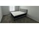 Well-lit bedroom with a comfortable bed and ample floor space at 3203 Laurent Loop, Davenport, FL 33837