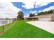 Lush green backyard with a private dock and lake access at 3651 S Rosalind Ave, Orlando, FL 32806
