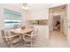 Eat-in kitchen features a breakfast nook, tiled flooring and view of the water at 3651 S Rosalind Ave, Orlando, FL 32806