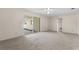 Bright living room with sliding glass doors leading to the patio at 3651 S Rosalind Ave, Orlando, FL 32806