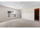 Spacious main bedroom features carpet, a window, and a walk-in closet at 3651 S Rosalind Ave, Orlando, FL 32806
