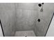 Contemporary tiled shower with matte black shower head and fixtures at 0 Robinson Dr, Haines City, FL 33844