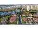 Aerial view of home near lake and high rise building at 10713 Berry Creek Rd, Orlando, FL 32836