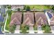 Luxury homes with tile roofs and solar panels at 10713 Berry Creek Rd, Orlando, FL 32836