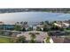 Community clubhouse with pool and tennis court at 10713 Berry Creek Rd, Orlando, FL 32836